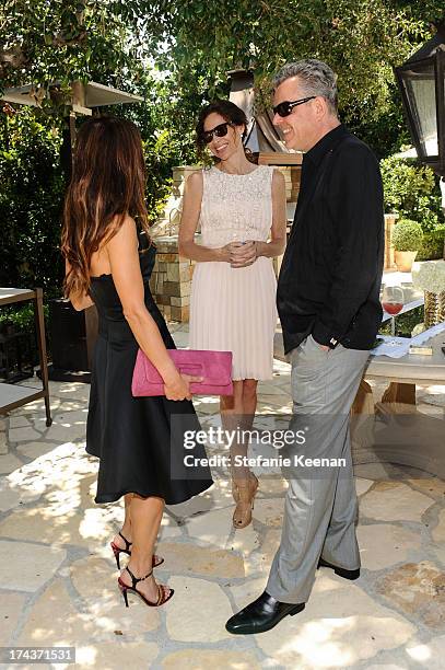 Rhona Mitra, Minnie Driver and Danny Huston attend Lorena Sarbu Resort 2014 Luncheon at on July 24, 2013 in Beverly Hills, California.