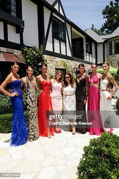 Models, Lorena Sarbu and Deborah Waknin attend Lorena Sarbu Resort 2014 Luncheon at on July 24, 2013 in Beverly Hills, California.