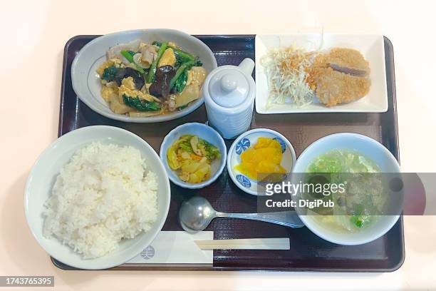 chūka teishoku - jewʼs ear stir fried with pork and egg, pork cutlet - takuan stock pictures, royalty-free photos & images