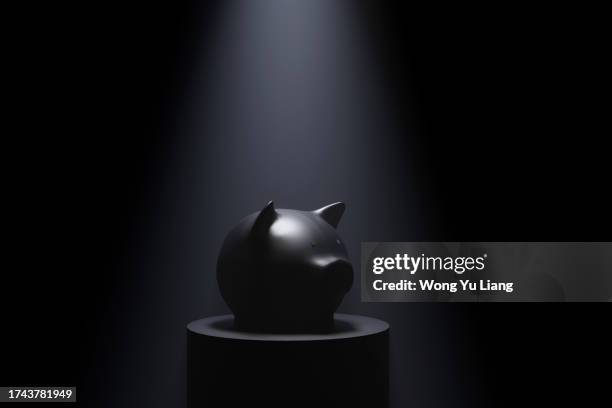 black piggy bank with ray of light ,3d render - safety deposit box stock pictures, royalty-free photos & images