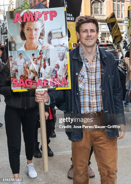 Chris Lowell is seen on the SAG-AFTRA picket line on October 24, 2023 in New York City.