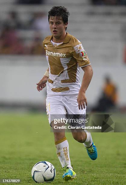 Erick Vera of Pumas drives the ball during a match between Leones Negros and Pumas, as part of the Cup MX at Jalisco Stadium on July 24, 2013 in...