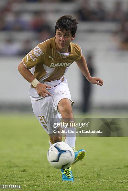 Erick Vera of Pumas drives the ball during a match between Leones Negros and Pumas, as part of the Cup MX at Jalisco Stadium on July 24, 2013 in...