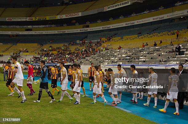 Team of Puma enter to the field prior a match between Leones Negros and Pumas, as part of the Cup MX at Jalisco Stadium on July 24, 2013 in...