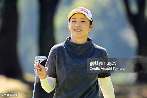 Rie Tsuji of Japan smiles after the birdie on the 6th green during the first round of NOBUTA Group Masters GC Ladies at Masters Golf Club on October...