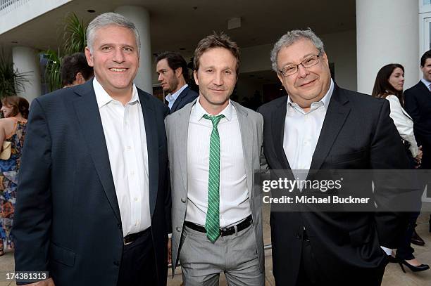 Phil Kent, Chairman and CEO Turner Broadcasting, actor Breckin Meyer and Steve Koonin, President, Turner Entertainment Networks, attend TNT 25TH...