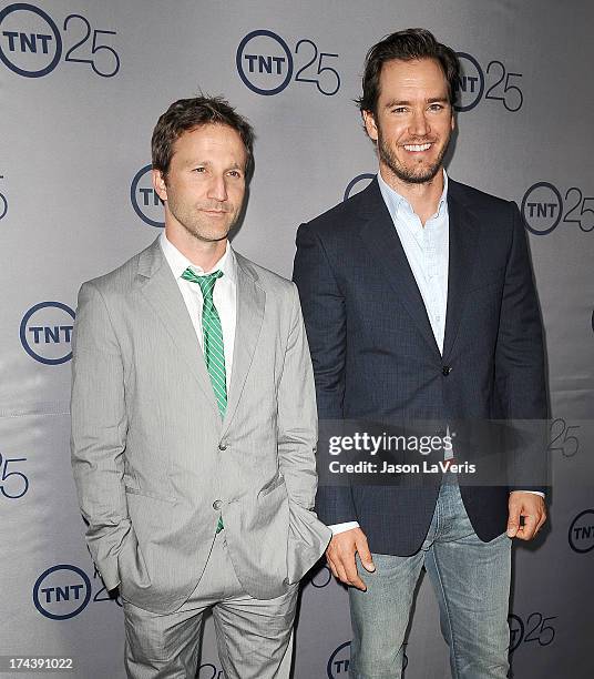 Actors Breckin Meyer and Mark-Paul Gosselaar attend TNT's 25th anniversary party at The Beverly Hilton Hotel on July 24, 2013 in Beverly Hills,...