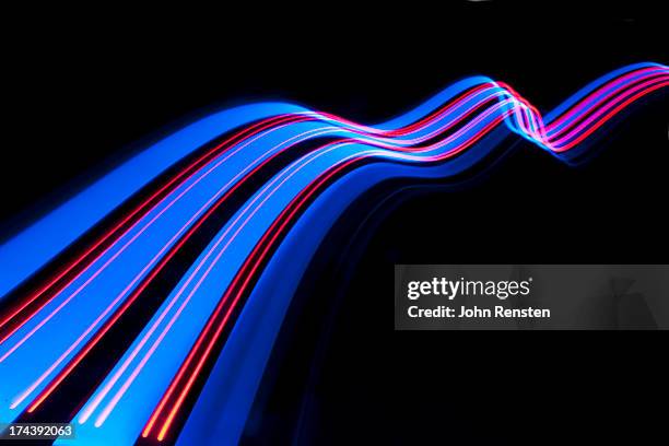 abstract light and heat trails - lichtspur stock-fotos und bilder