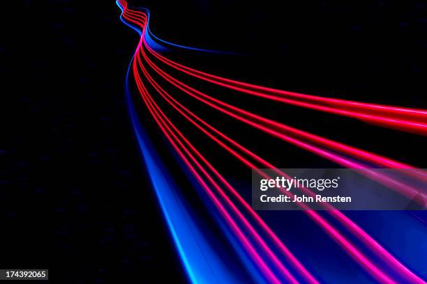 abstract light and heat trails - slow shutter speed stock-fotos und bilder