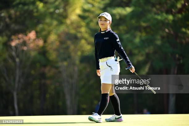 Shuri Sakuma of Japan reacts after a putt on the 9th green during the first round of NOBUTA Group Masters GC Ladies at Masters Golf Club on October...
