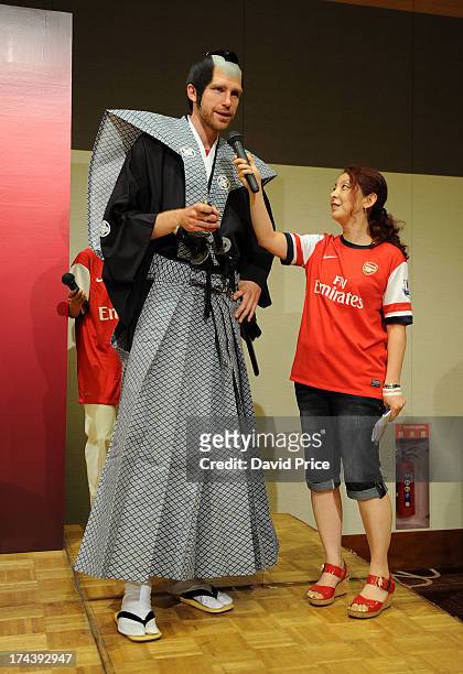 Per Mertesacker of Arsenal FC poses dressed as a Samurai Warrior at the Arsenal Fans Party in the Urawa Royal Pines Hotel in Japan for the club's...