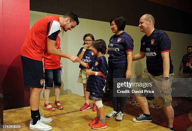 Carl Jenkinson of Arsenal FC meets a family called the Jenkinsons that live in Japan and support Arsenal at the Arsenal Fans Party in the Urawa Royal...