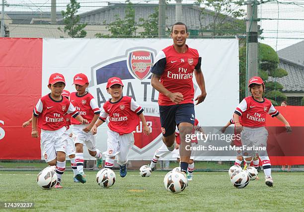 Arsenal's Theo Walcott attends an Emirates Soccer Clinic in Saitama during the club's pre-season Asian tour on July 25, 2013 in Saitama, Japan.