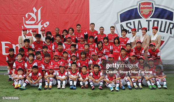 Arsenal players Kieran Gibbs, Wojciech Szczesny, Theo Walcott, Aaron Ramsey, Olivier Giroud and Tomas Rosicky attend an Emirates Soccer Clinic in...