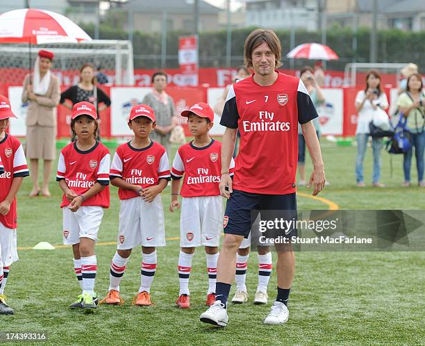 Arsenal's Tomas Rosicky attends an Emirates Soccer Clinic in Saitama during the club's pre-season Asian tour on July 25, 2013 in Saitama, Japan.