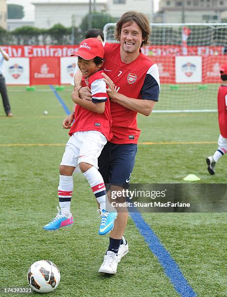 Arsenal's Tomas Rosicky attends an Emirates Soccer Clinic in Saitama during the club's pre-season Asian tour on July 25, 2013 in Saitama, Japan.