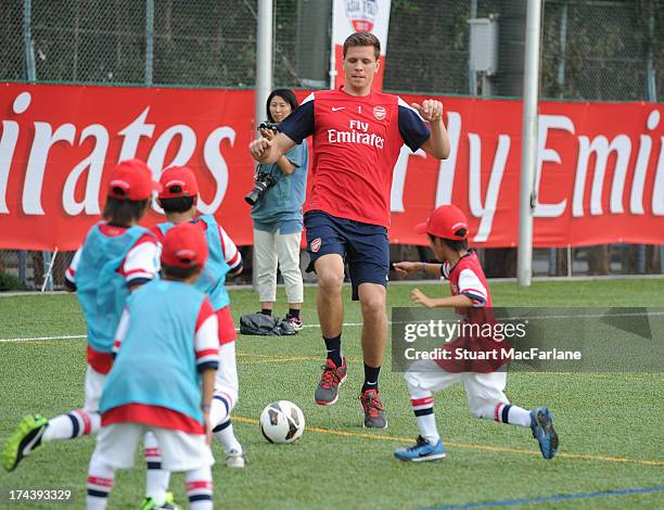 Arsenal's Wojciech Szczesny attends an Emirates Soccer Clinic in Saitama during the club's pre-season Asian tour on July 25, 2013 in Saitama, Japan.