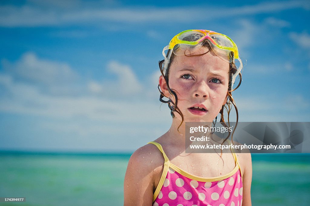 Goggles and beach waves