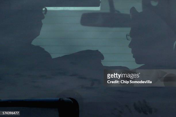 Army Private First Class Bradley Manning has his baret adjusted before exiting the vehicle as he arrives for closing arguments in his military trial...