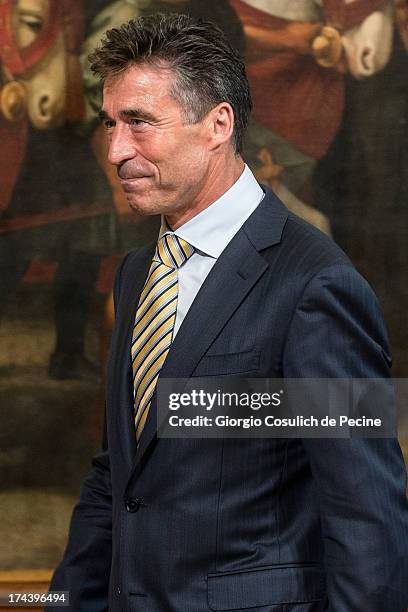 Secretary General of NATO Anders Fogh Rasmussen leaves after a press conference with Italian Prime Minister Enrico Letta at Palazzo Chigi on July 25,...