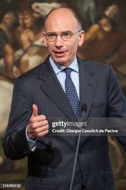 Italian Prime Minister Enrico Letta gestures as he attends a press conference with Secretary General of NATO Anders Fogh Rasmussen at Palazzo Chigi...