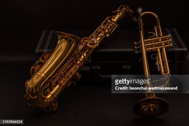 classical cornet instrument isolated from a black background. - classical orchestral music stock pictures, royalty-free photos & images