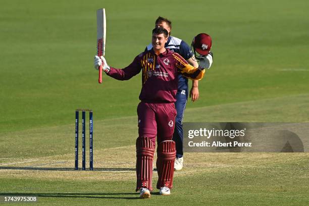 Matthew Renshaw of Queensland celebrates his century during the Marsh One Day Cup match between Queensland and Victoria at Great Barrier Reef Arena,...