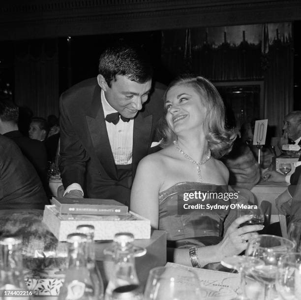 British hairdresser Vidal Sassoon with Sue Rowe at the Dorchester Hotel, London, 29th November 1960.