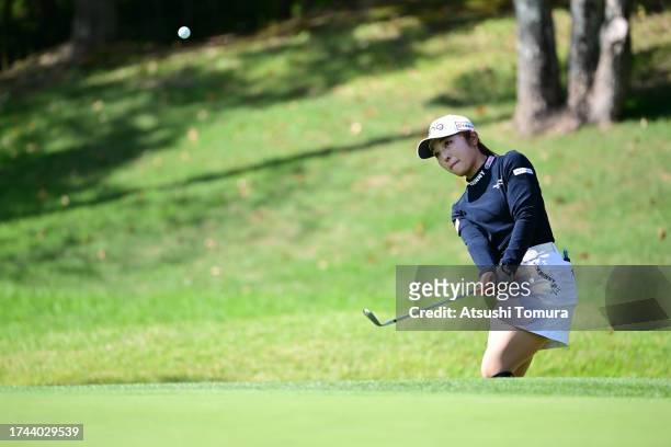 Shuri Sakuma of Japan chips onto the 8th greenduring the first round of NOBUTA Group Masters GC Ladies at Masters Golf Club on October 19, 2023 in...