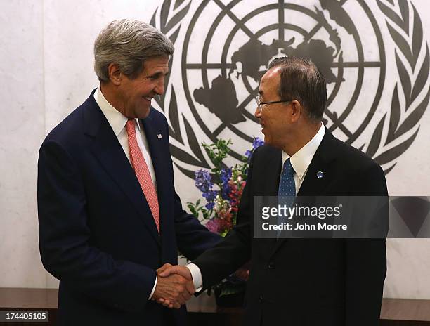 Secretary of State John Kerry and UN Secretary General Ban Ki-moon meet before a meeting of the UN Security Council on July 25, 2013 in New York...