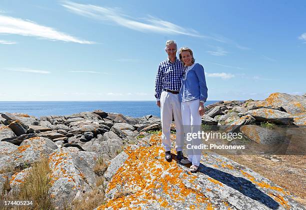 King Philippe of Belgium and Queen Mathilde of Belgium pose during their holiday on l'Ile d'Yeu on July 24, 2013 in Yeu, France.