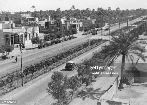 Traffic on a street in Baghdad, Iraq, circa 1950.