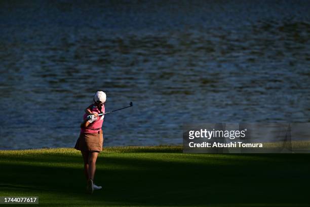 Nagai Kana of Japan hits her second shot 16 during the first round of NOBUTA Group Masters GC Ladies at Masters Golf Club on October 19, 2023 in...