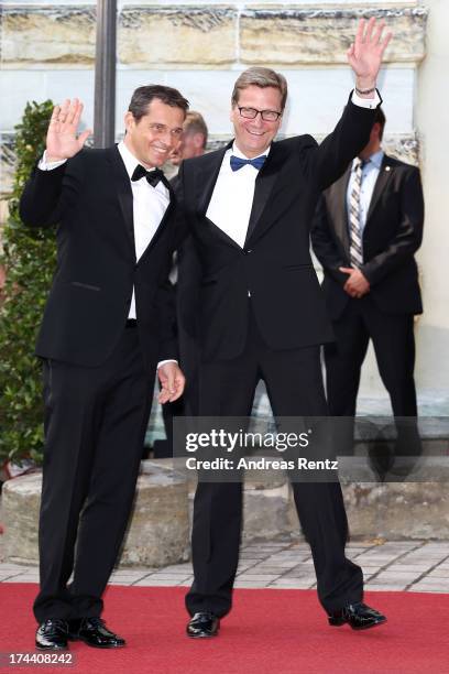 German Foreign Minister Guido Westerwelle and Michael Mronz attend Bayreuth Festival Opening 2013 on July 25, 2013 in Bayreuth, Germany.