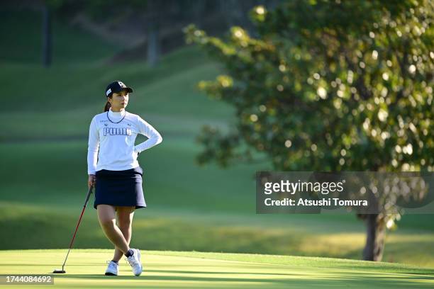 Erika Kikuchi of Japan is seen on the 17th green during the first round of NOBUTA Group Masters GC Ladies at Masters Golf Club on October 19, 2023 in...