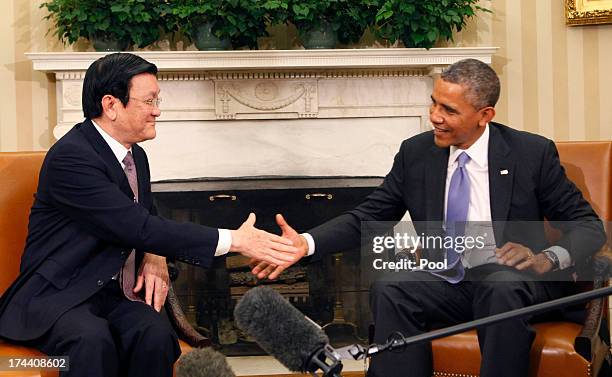 President Barack Obama meets with President Truong Tan Sang of Vietnam in the Oval Office on July 25, 2013 in Washington, D.C. The visit is seen as...