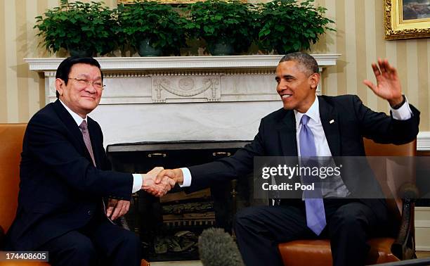 President Barack Obama meets with President Truong Tan Sang of Vietnam in the Oval Office on July 25, 2013 in Washington, D.C. The visit is seen as...