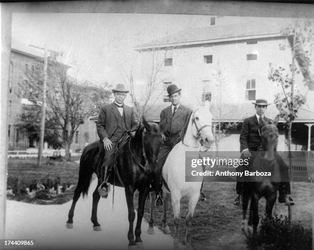 View of American educator, economist, and industrialist Booker T Washington , founder of the Tuskegee Institute in Alabama, with his sons Booker T...