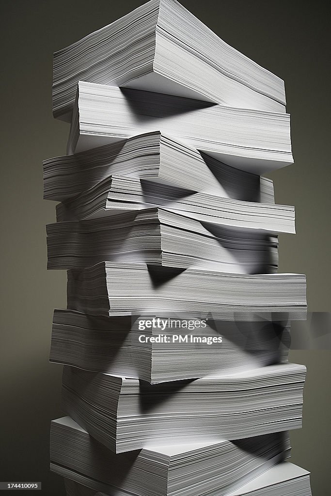 Crisscrossing stacks of paper