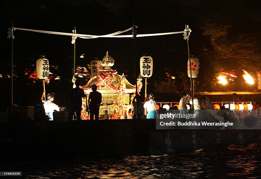 Tenjin Images People dressed in traditional costume carry portable shrine by boat ...