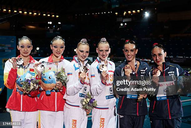 Silver medal winners Jiang Tingting and Jiang Wenwen of China , Gold medal winners Svetlana Kolesnichenko and Svetlana Romashina of Russia , and...