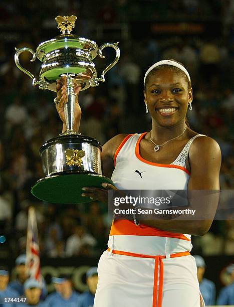 Serena Williams of the USA holds the winners trophy during the Women's Singles final during the Australian Open Tennis Championships at Melbourne...