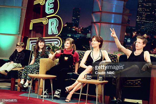Episode 1539 -- Pictured: Kid Inventors, actress Geena Davis, musician Jonny Lang, host Jay Leno during an interview on February 4, 1999 --