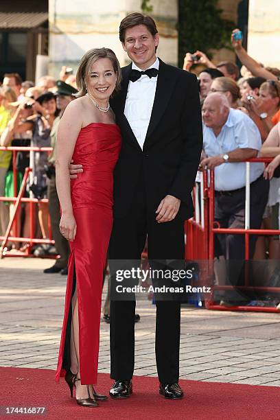 German Family Minister Kristina Schroeder and her husband Ole Schroeder attend the Bayreuth Festival opening on July 25, 2013 in Bayreuth, Germany.