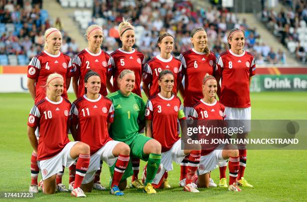 Denmark's players pose for their team's photo prior to the UEFA Women's European Championship Euro 2013 semi final football match Norway vs Denmark...