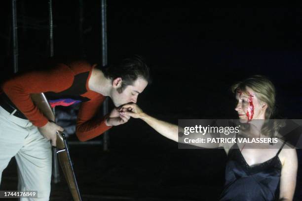 Actors Janice Akers and Daniel Pettrow perform in the play "Black Battles With Dogs" written by Bernard-Marie Koltes and directed by Arthur...