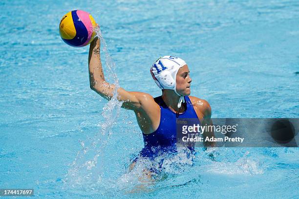 Aleksandra Cotti of Italy looks to pass against Brazil during the Women's Water Polo first preliminary round match between Italy and Brazil during...