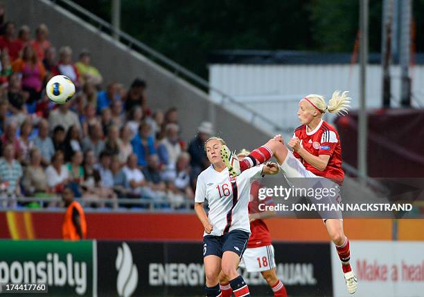 Norway's defender Kristine Hegland and Denmark's defender Christina Orntoft vie for the ball during the UEFA Women's European Championship Euro 2013...