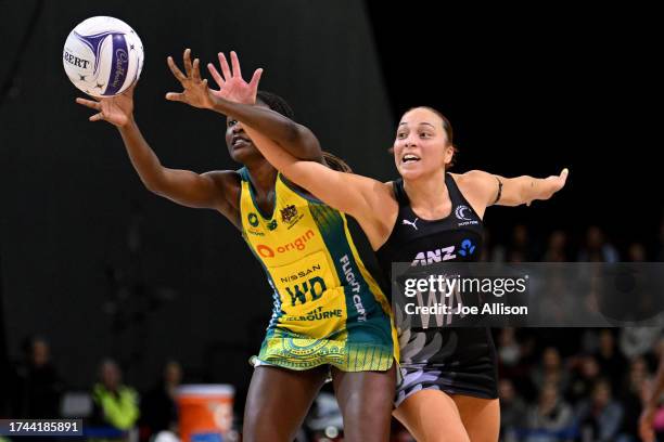 Sunday Aryang of Australia and Mila Reuelu-Buchanan of New Zealand compete for the ball during game three of the Constellation Cup series between New...