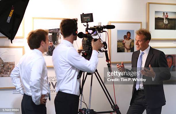 Photographer Chris Jackson gives an interview at the private view of 'Sentebale - Stories Of Hope' at Getty Images Gallery on July 25, 2013 in...